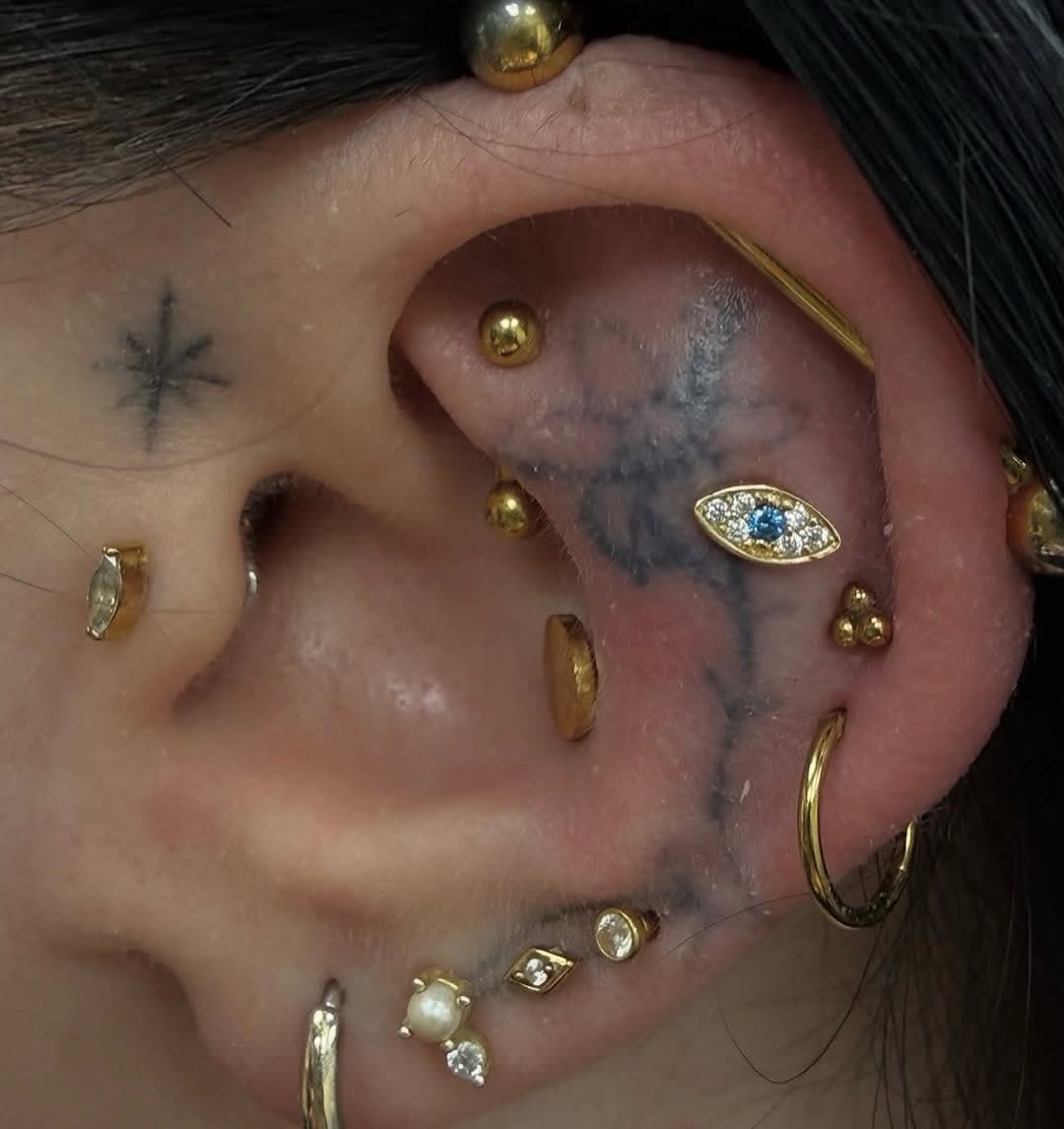 Tattoo work by Gunns and Roses Tattoo and Piercing Parlor — photo 7 of 10